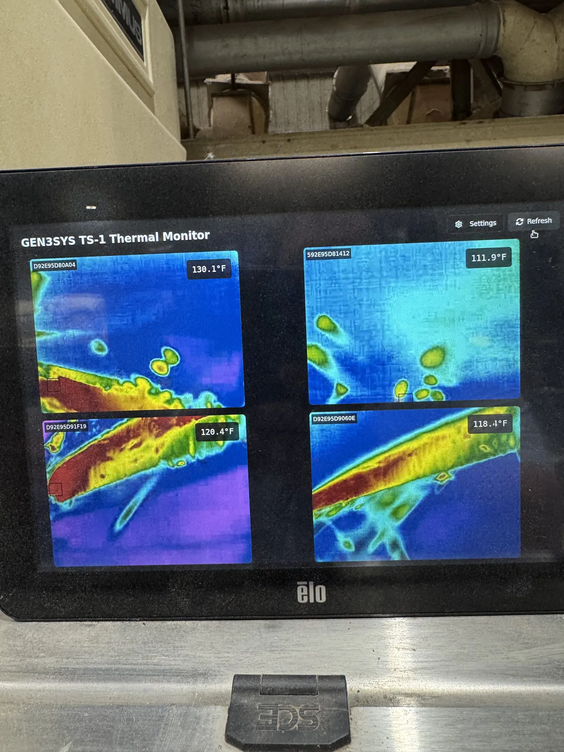 A TS-1 screen at a gin showing four live thermal camera views, each labeled with its own temperature reading